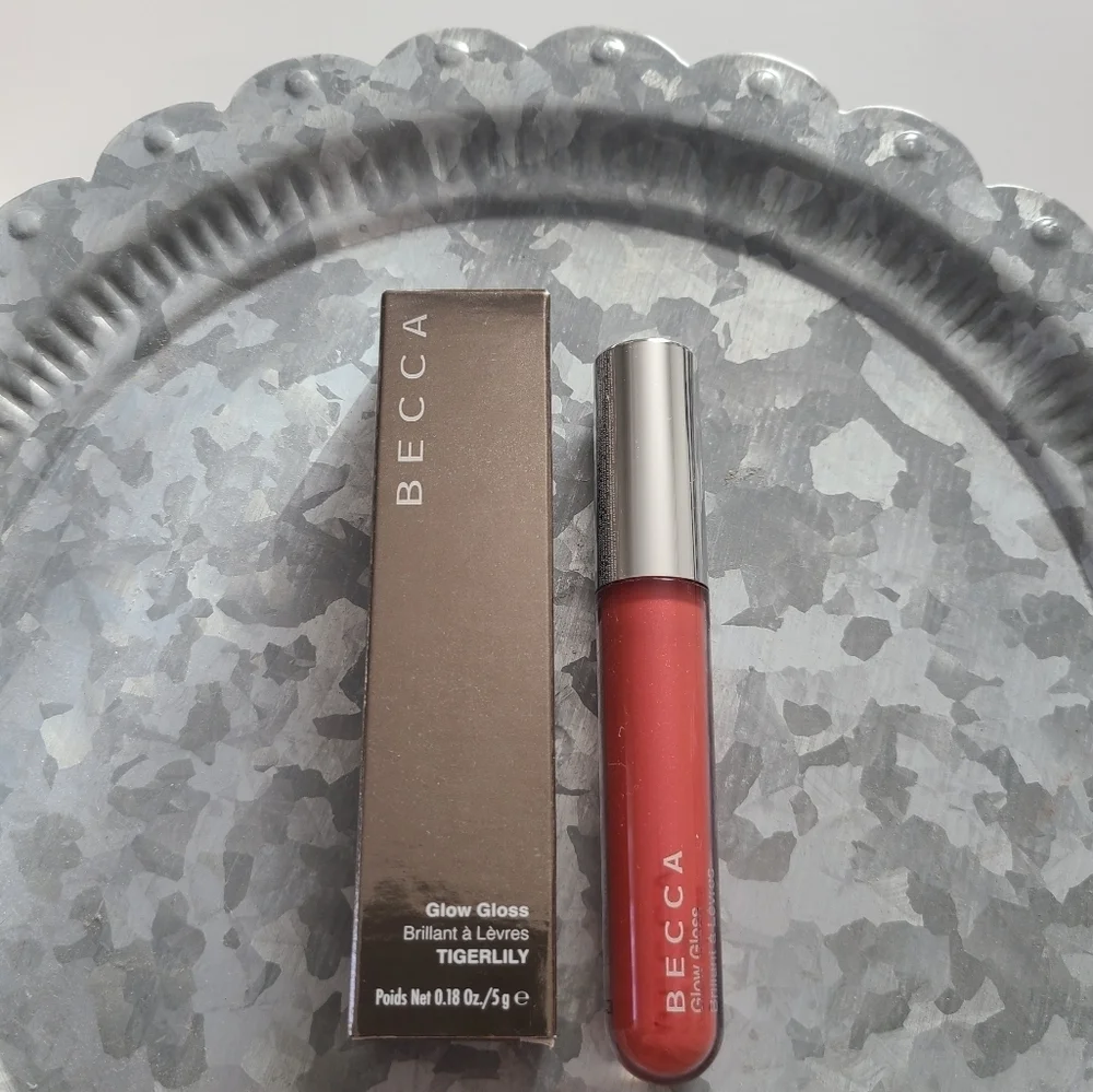 ⭐️40% Off⭐️ Becca Glow Gloss in Tigerlily